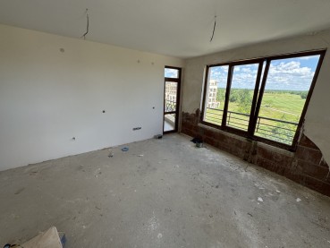 Apartament cu un dormitor într-un complex de golf